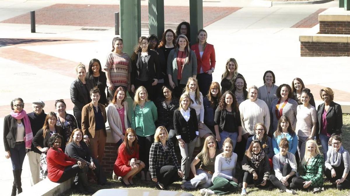 Young professional women of Wichita pose for a group shot of the faces of Wichita’s college-educated workforce. (March 2, 2017)