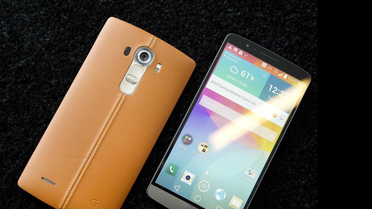 
The leather-covered LG G4, left, is displayed next to an LG G3, on Tuesday in New York. LG is making smartphones with leather backs as it seeks to distinguish its phones from Apple's iPhones and Samsung's Galaxy smartphones. 
