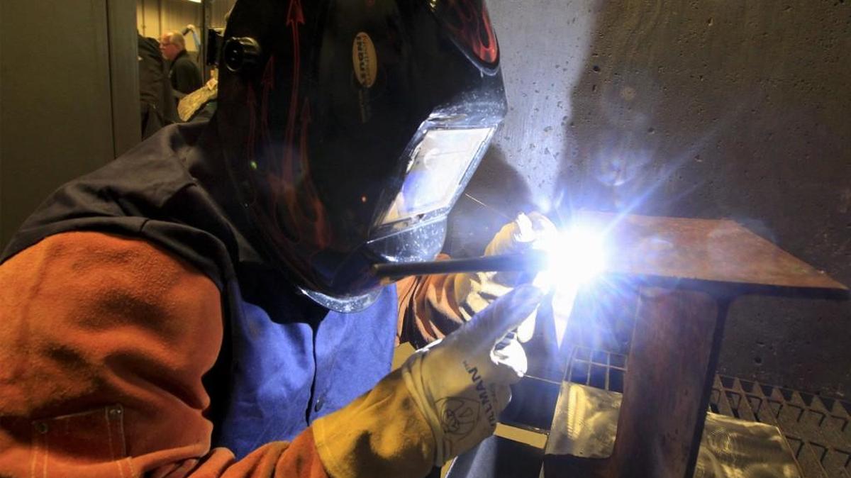 Wichita Area Technical College student Juan Castillo works in the school’s Welding and Architectural Design class. An agreement to merge WATC into Wichita State University went to the Kansas Board of Regents this week. (Oct 18, 2016)