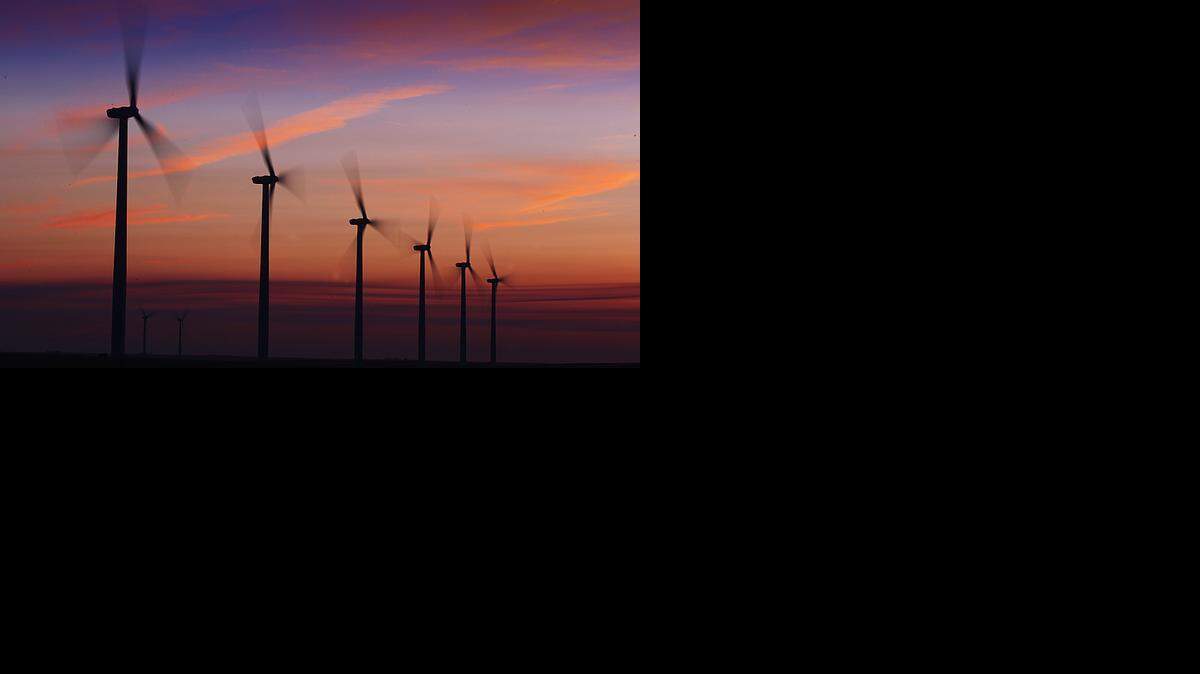 
Sunset highlights wind turbines at the Elk River Wind Farm, about six miles south of Beaumont in the southeastern corner of Butler County. Construction activity on wind farms in Kansas has picked up this year.
