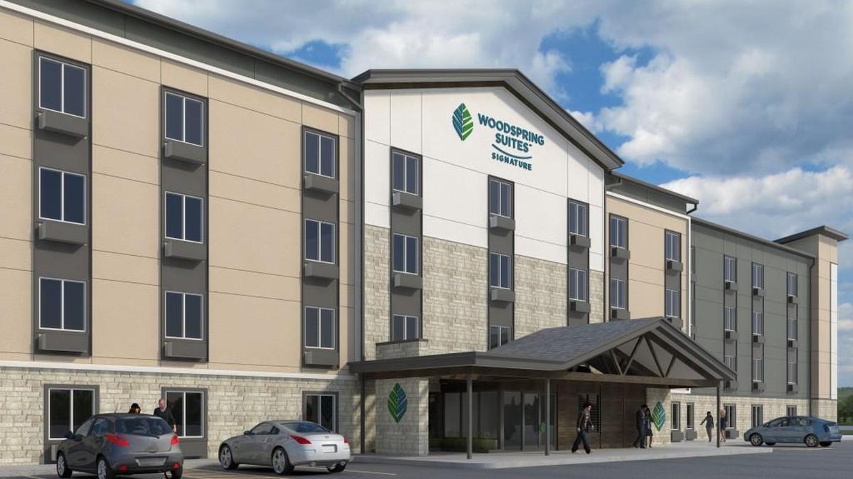 WoodSpring Hotels operations include its upscale WoodSpring Suites Signature properties.