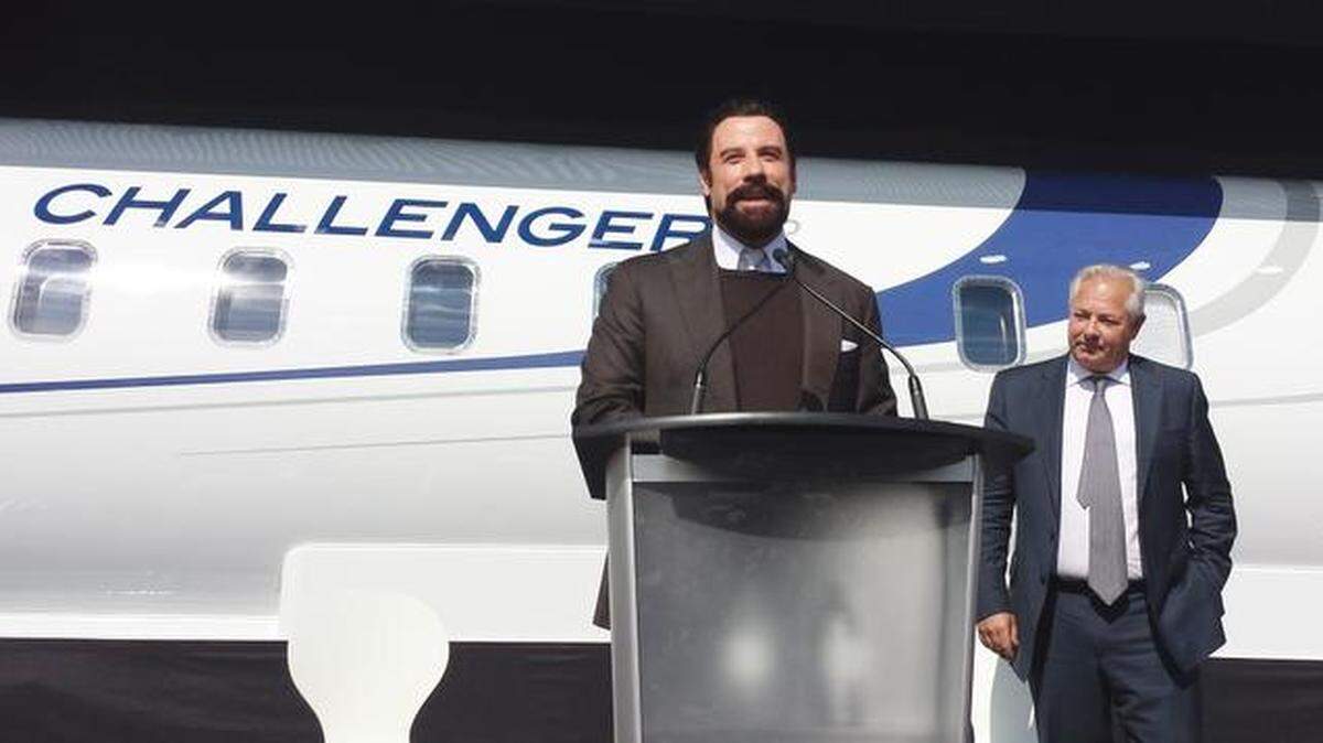 Actor John Travolta appeared in 2014 at the National Business Aviation Association convention in Orlando, Florida. Travolta, a pilot, appeared at the Bombardier display.