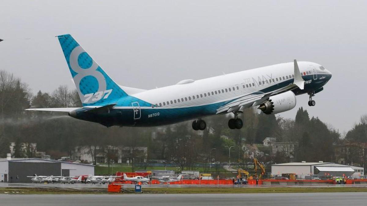 A Boeing 737 Max takes off on its first test flight on Friday in Renton, Wash.