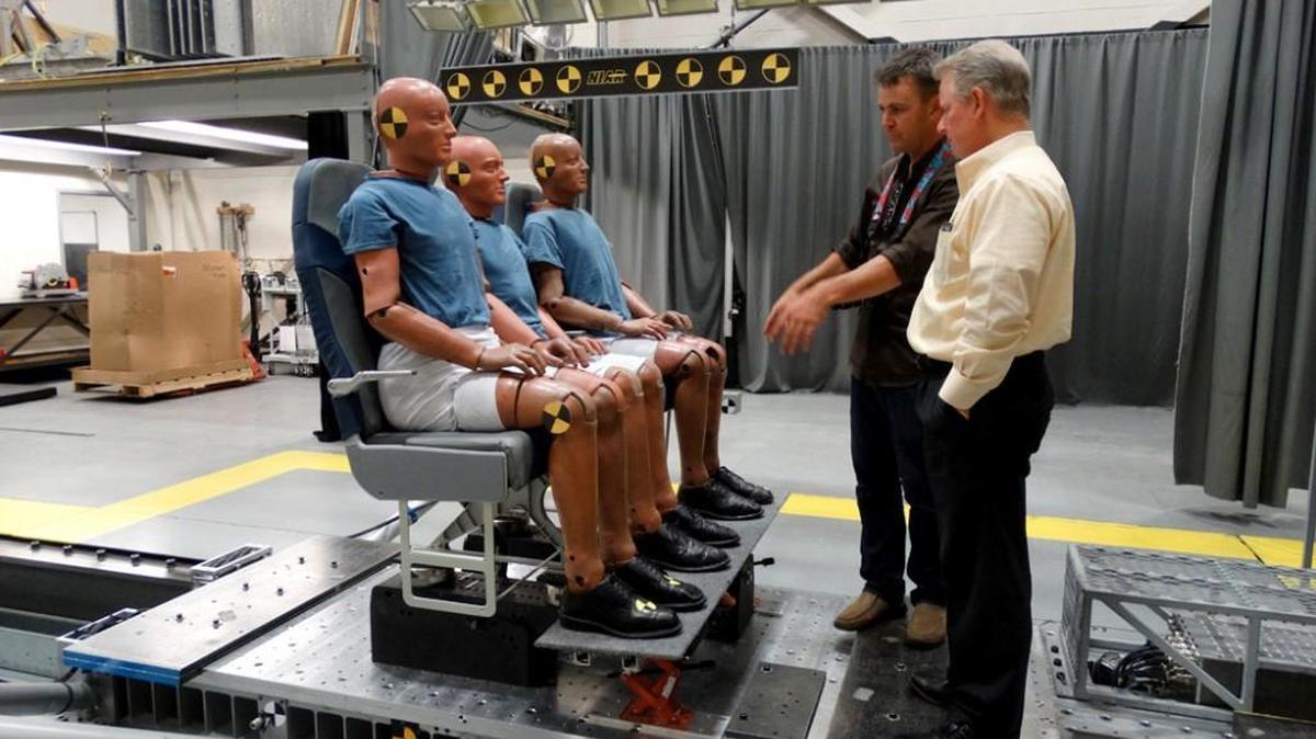 Molon Labe CEO Hank Scott, left, talks with Alan Goodnight of WSU Ventures at the National Institute for Aviation Research, which is assisting Molon in the design and testing of its new aircraft seats.
