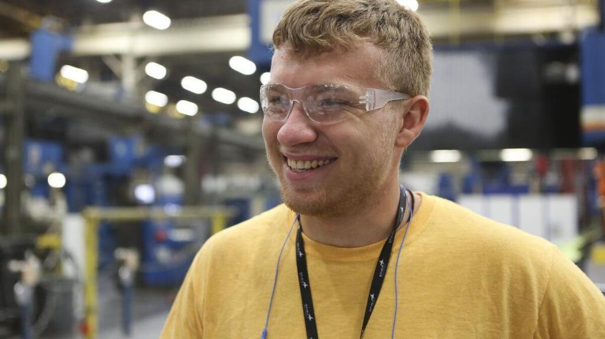 Jeffrey Parker, a 19-year-old recent Douglass High School graduate, is one of about 20 high school kids who are working at Spirit for a summer job. Spirit sees this as an opportunity to get youth interested in pursuing aircraft production jobs after graduating from high school. (July 25, 2017)