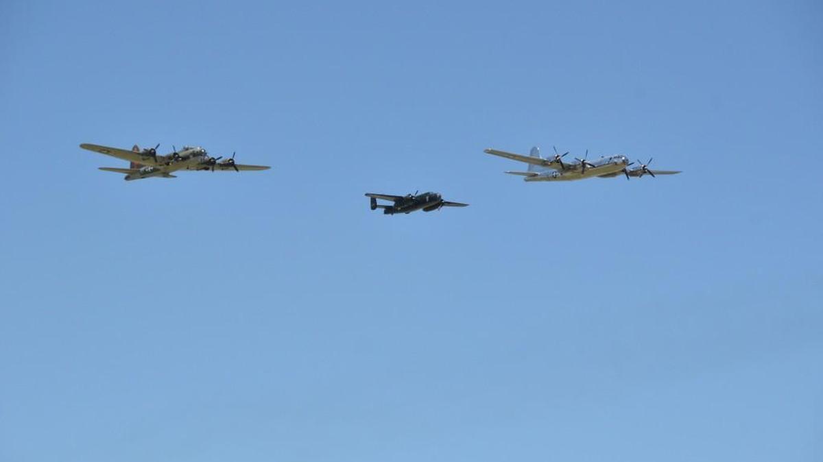 A B-17 and a B-25 fly alongside B-29 “Doc” before landing Friday afternoon at Barksdale Air Force Base in Louisiana for the Defenders of Liberty Airshow. (May 5, 2017)
