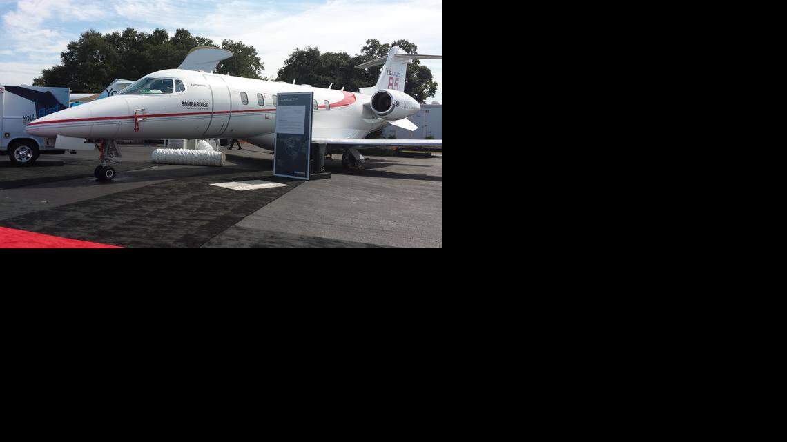 Bombardier’s display at the Orlando Executive Airport last October showcases its line of business jets, including the Learjet 85, 70 and 75. Bombardier says it’s going to cut about 1,000 employees from its Learjet business in 2015, affecting sites in Wichita and Mexico.

