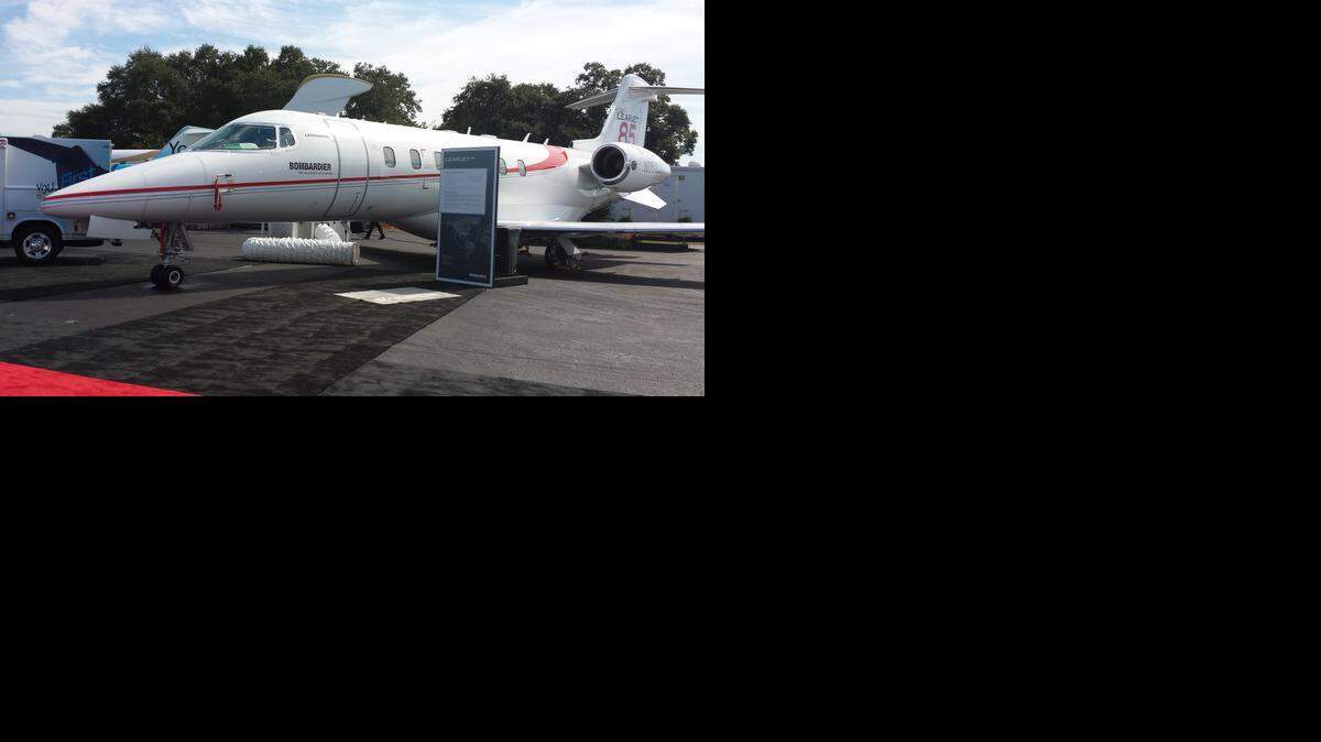 Bombardier’s display at the Orlando Executive Airport last October showcases its line of business jets, including the Learjet 85, 70 and 75. Bombardier says it’s going to cut about 1,000 employees from its Learjet business in 2015, affecting sites in Wichita and Mexico.

