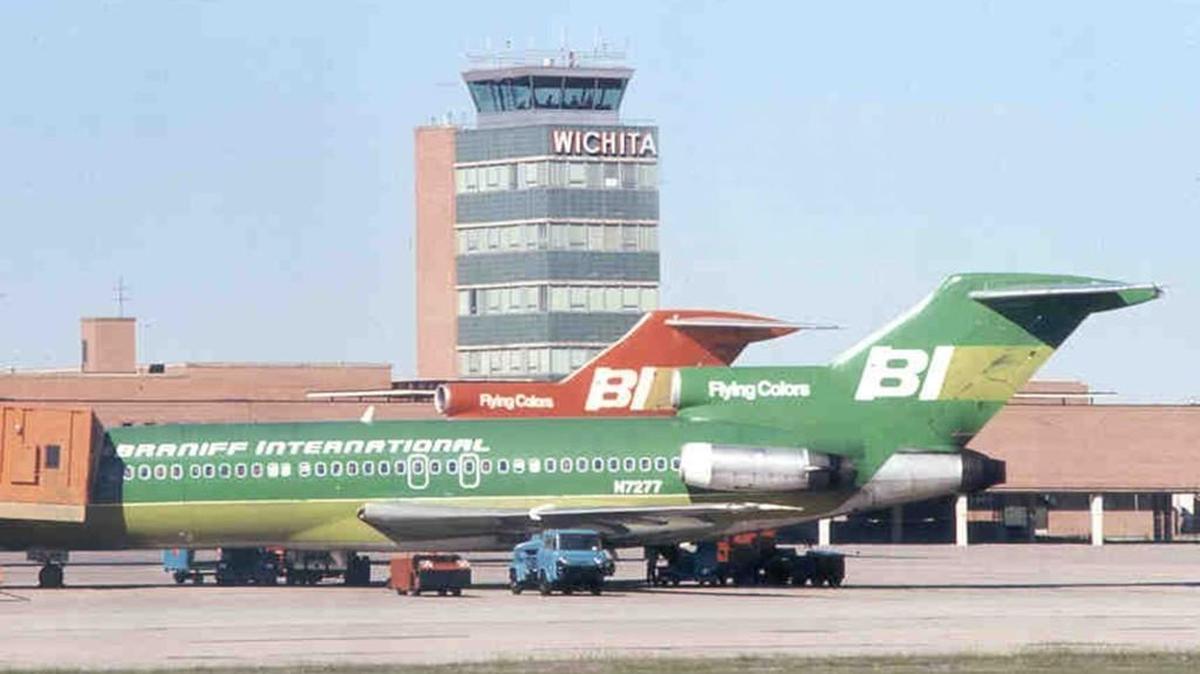 Two Braniff International 727s are parked at Wichita Mid-Continent Airport.