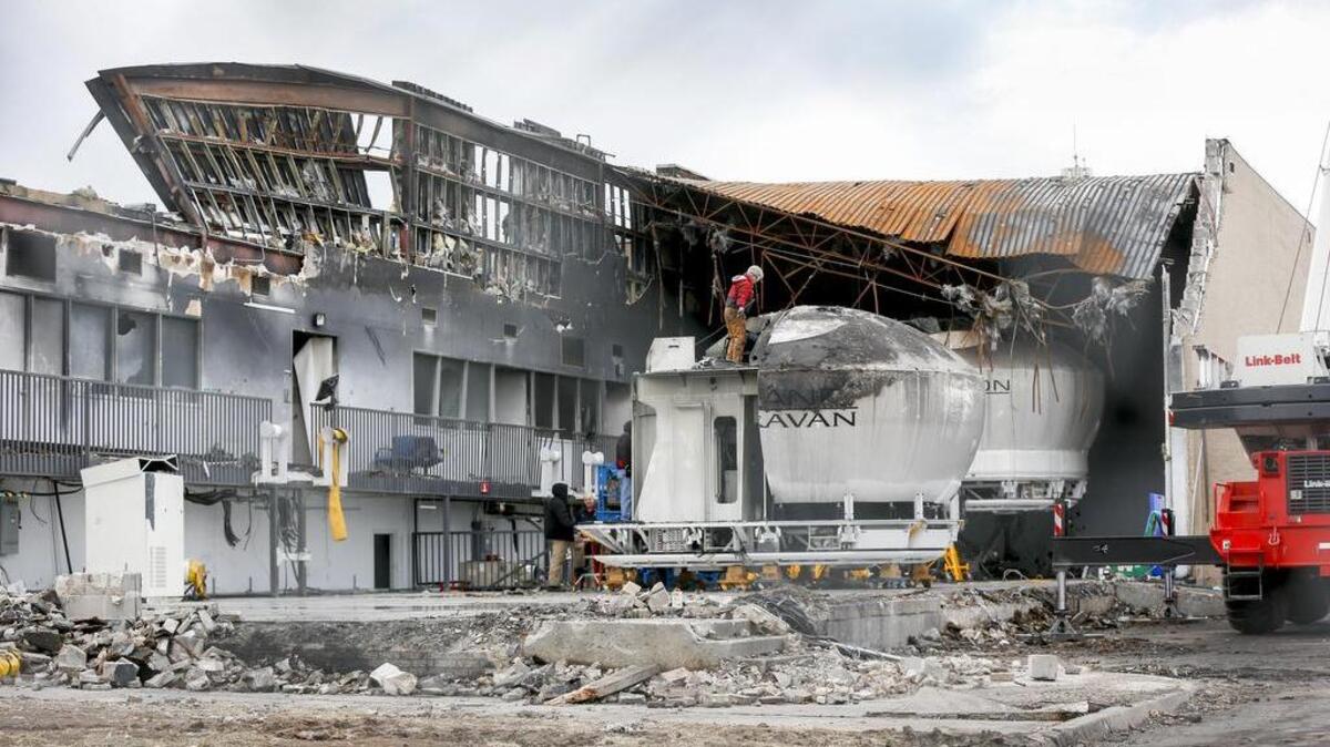 Workers were still cleaning up at the FlightSafety Cessna Pilot Center building 3 months after a King Air airplane crashed into it in late October.