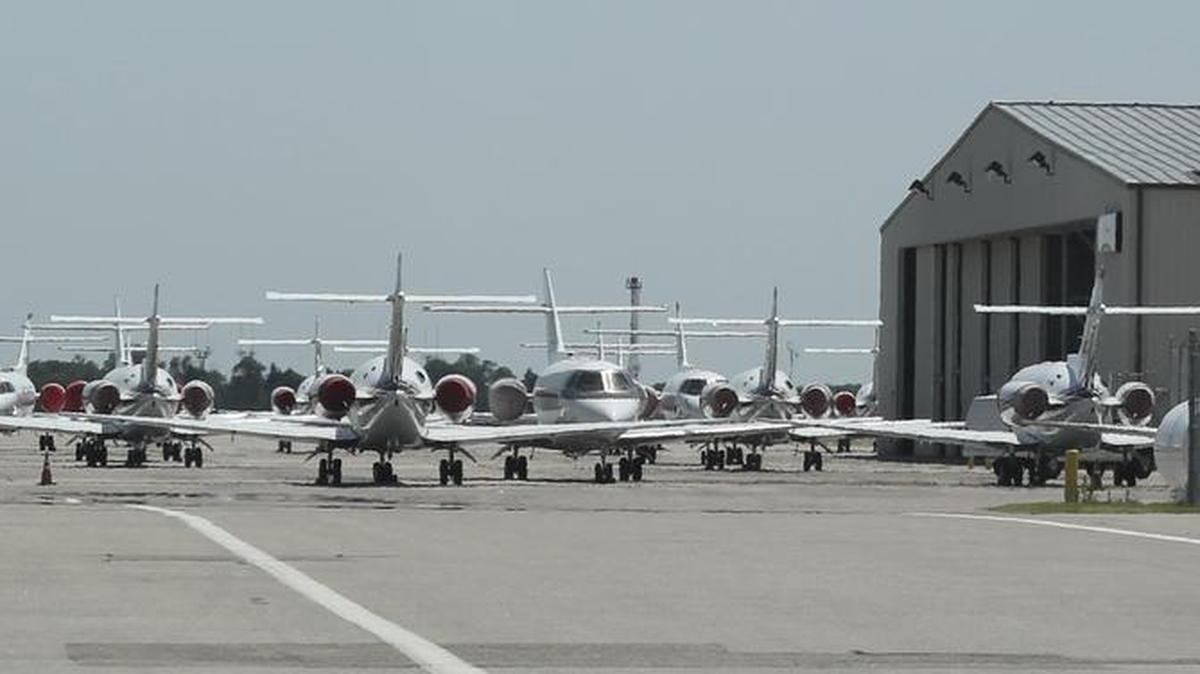 Business jets sit outside a hangar at Wichita Eisenhower National Airport in June. Nearly half of the world’s business jet fleet is 15 years or older, but aging planes aren’t being replaced as quickly as would normally be expected, industry experts say.