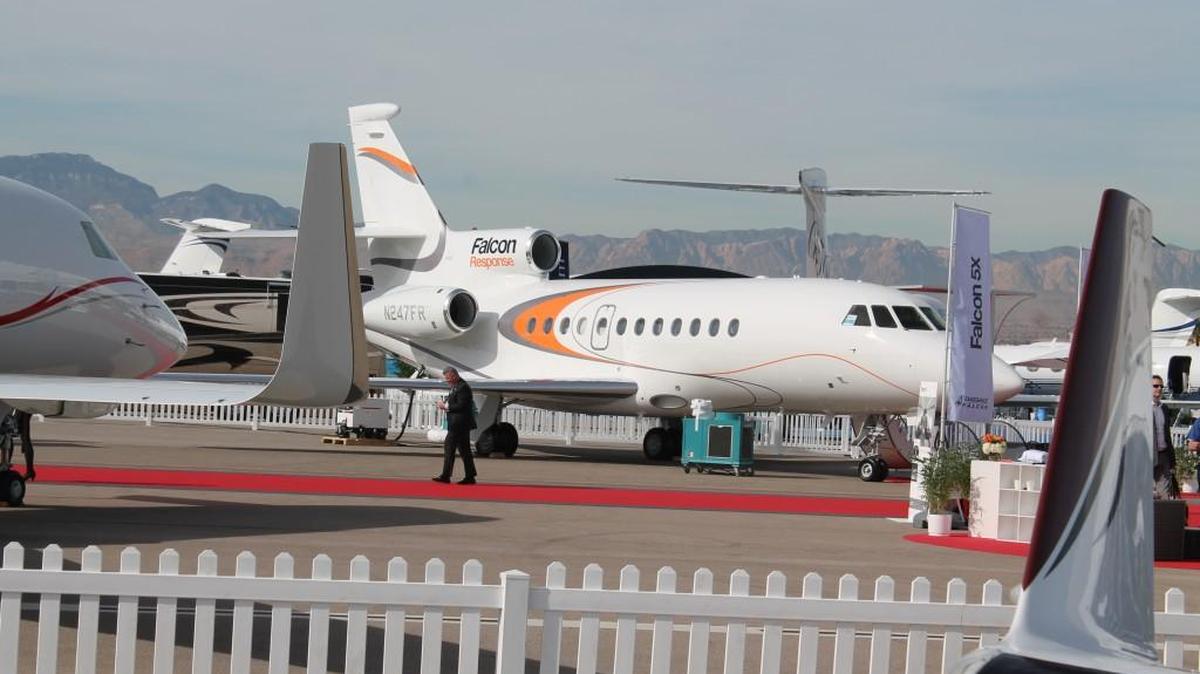 A Dassault Aviation Falcon jet sits at the company’s static display at Henderson Executive Airport during the 2015 National Business Aviation Association Convention in Las Vegas.