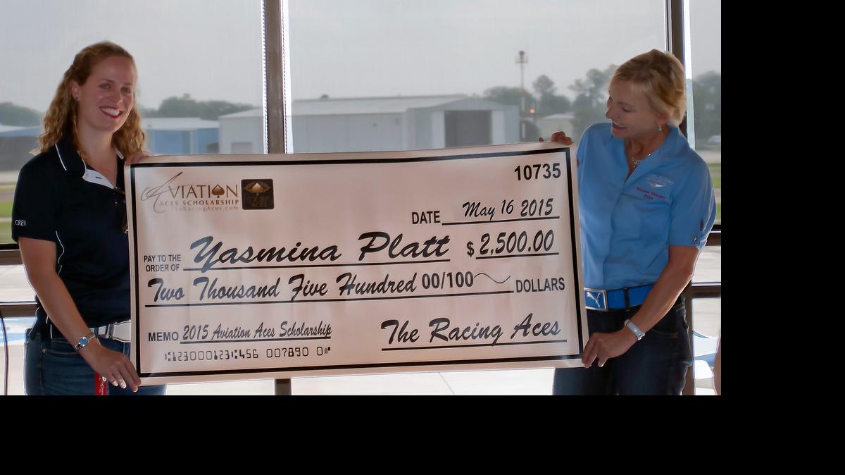 
Yasmina Platt, AOPA regional manager for Kansas and eight other states, received a $2,500 scholarship from the Racing Aces and one of its pilots, Dianna Stanger, earlier this month.
