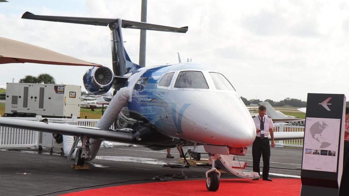 Embraer saw deliveries of light jets, including the Phenom 100 like the one pictured here at the 2016 National Business Aviation Association Convention, fall 30 percent in the second quarter of 2017.