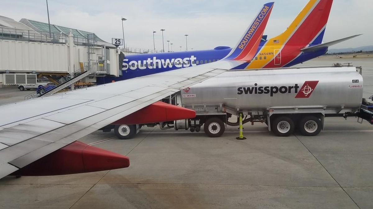Southwest Airlines airplanes parked at the gates at San Jose International Airport.