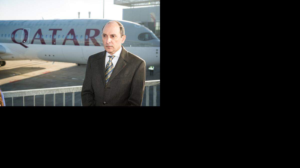 
Qatar Airways CEO Akbar al Baker poses during the hand over ceremony of the first Airbus A350 for Qatar Airways in Toulouse, southwestern France, on Monday. After years of delays, Airbus delivered its first A350 wide-body jet Monday, to Qatar Airways. The A350 XWB is intended as Airbus’ best hope for catching up in the long-haul market that is dominated by Boeing's 777 and 787, but has been plagued by delays and a multibillion dollar revamp. 
