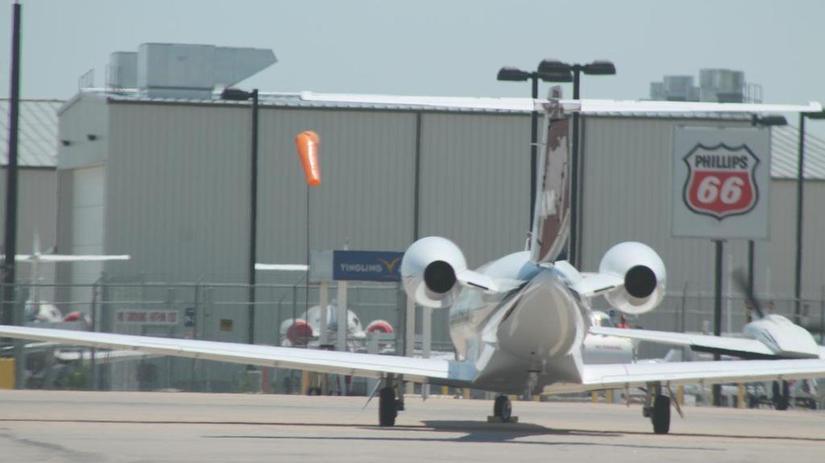 A business jet is parked near Wichita Eisenhower National Airport’s fuel farm in June. An airport official said Friday sales of avgas at the airport have resumed.