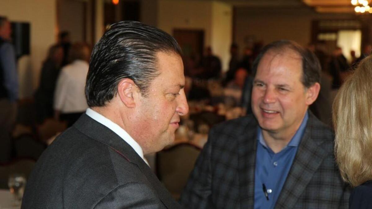 Wheels Up CEO Kenny Dichter, left, with Textron Aviation CEO Scott Ernest at Thursday’s Wichita Aero Club luncheon at Crestview Country Club.