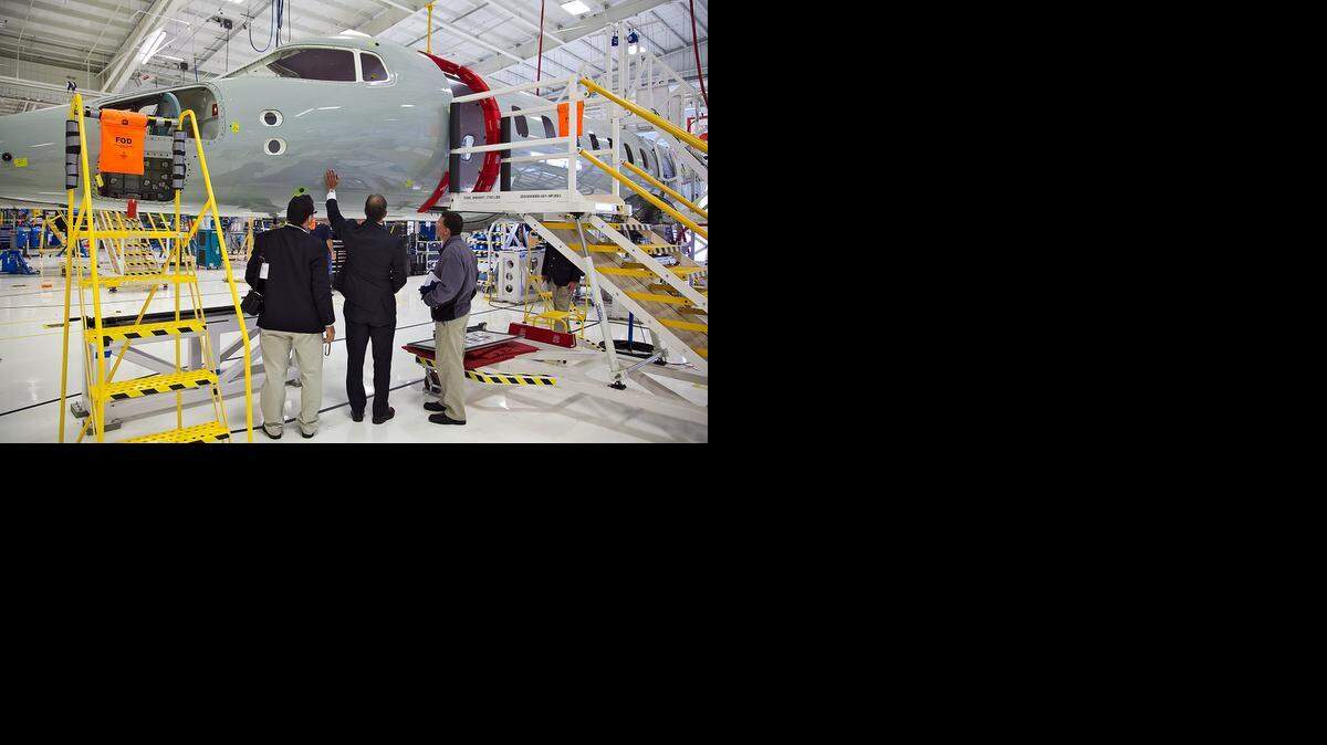 
Visitors to Bombardier Learjet check out the Model 85 fuselage at the Wichita plant in 2012.
