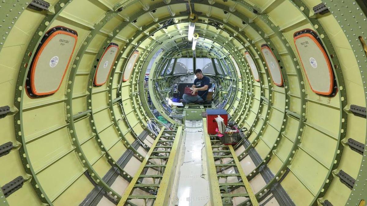 
Work is done inside the fuselage of a Cessna Citation business jet on the assembly line at Textron Aviation’s plant.
