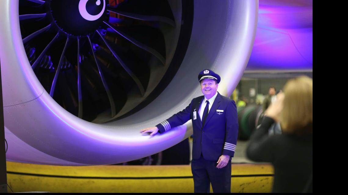 
Captain Fergie Ferguson poses for a personal snapshot with American Airlines' first Boeing 787 Dreamliner at the airline's maintenance hangar at Dallas-Fort Worth International Airpor, Wednesday. American Airlines unveiled the new passenger jet to employees and media before it goes into service May 7.
