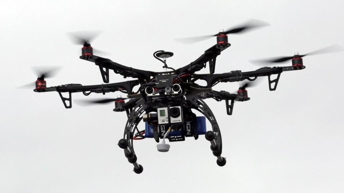 FILE - In this Feb. 13, 2014, file photo, a drone is demonstrated in Brigham City, Utah.