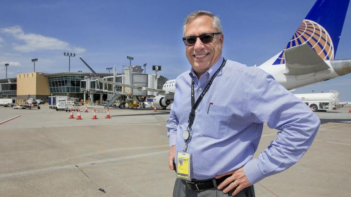 Victor White, director of airports for the Wichita Airport Authority, stands on the tarmac of Wichita Eisenhower National Airport. He’s looking for ways to attract new tenants for parcels of empty ground at Eisenhower and Jabara. (June 6, 2017)