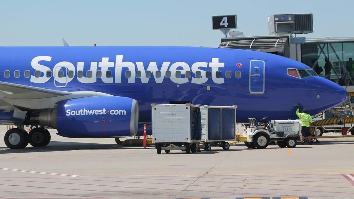A ground crewman prepares a Southwest Airlines flight for departure from Wichita Eisenhower National Airport. (June 22, 2017)