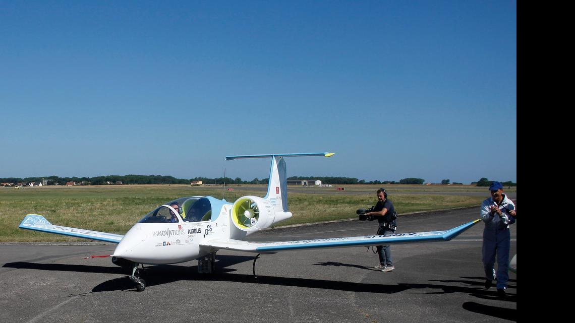 
French pilot Didier Esteyne lands after crossing the English Channel with his Airbus E-Fan prototype Friday at the Calais Airport in northern France. Airbus flew its electric plane across the English Channel for the first time Friday, hours after a French pilot made a similar voyage in his electric plane — journeys seen as a symbolically important step toward making electronic flight viable in the long term.
