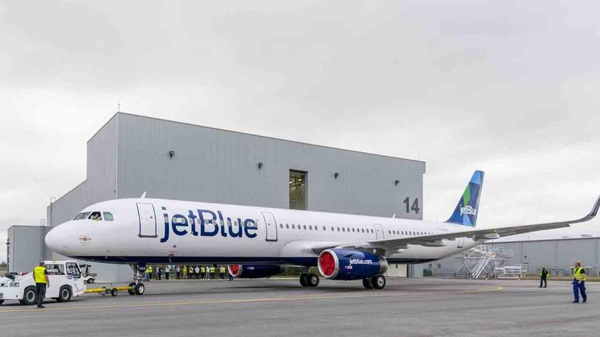 Workers at Airbus’ plant in Mobile, Ala., roll out the plant’s first A320 in March. Airbus said Friday it plans to fly the plane for the first time on Monday morning.