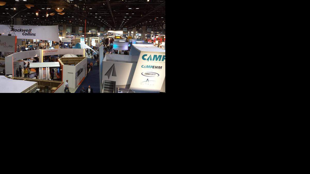 
Exhibits for aviation-related companies create a maze for visitors on the exhibition floor at the National Business Aviation Association conference, which is being held in Orlando, Fla. The event runs through Thursday.
