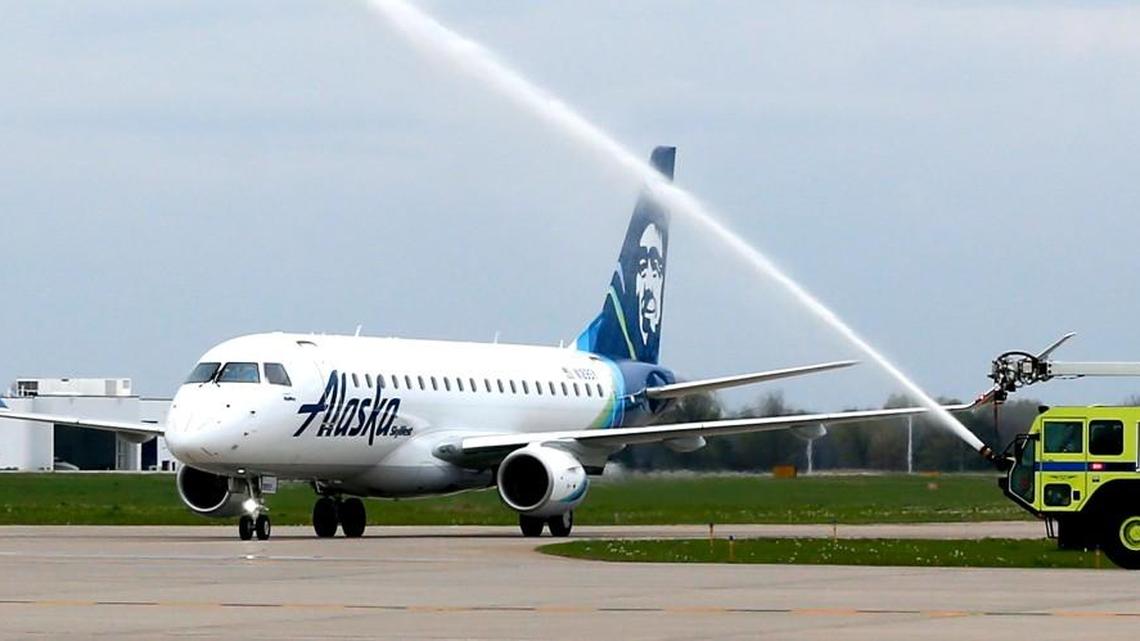 Alaska Airlines first non-stop flight from Seattle lands at Wichita Eisenhower National Airport in April to a water canon salute. The Embraer E175 regional jet that Alaska operates on the route is powered by a GE engine that its plant in Cowley County will begin assembling next year.