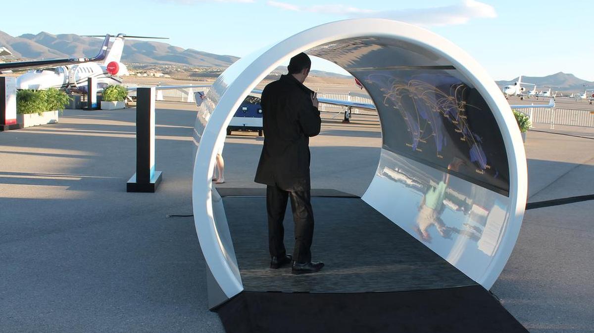 A customer stands in a mock-up of the cabin of Textron Aviation Cessna’s Citation Hemisphere jet, a large-cabin, long-range jet announced by the company at the National Business Aviation Association Convention last week.