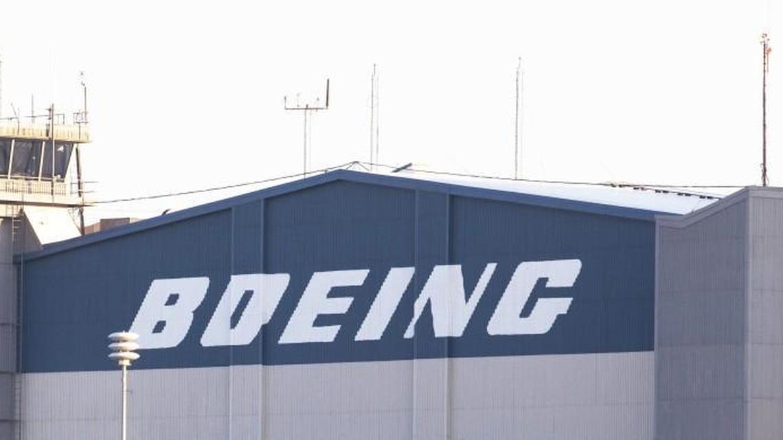 Boeing Co.’s logo sits atop the Wichita Modification Center on south Oliver in 2012.