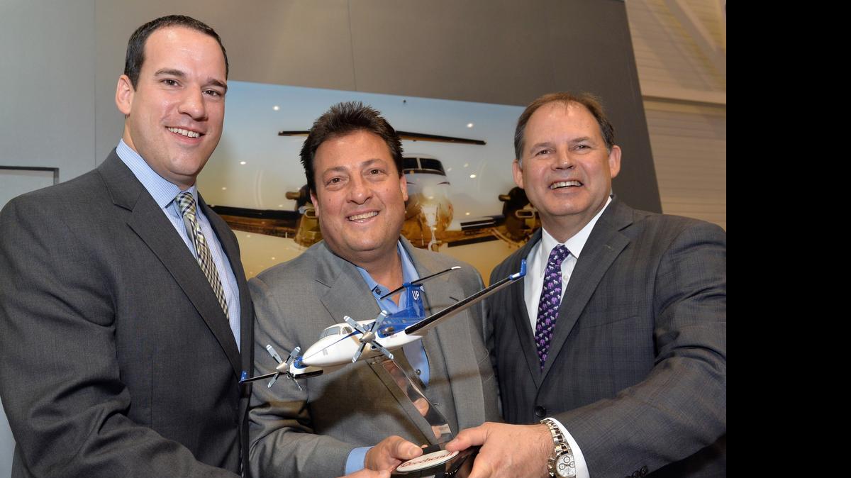 
From left, Patrick Buckles, King Air business leader, poses with Kenny Dichter, CEO of Wheels Up, and Scott Ernest, Textron Aviation CEO, following Wheels Up’s announcement at the European Business Aviation Convention & Exposition that it was exercising a second option to purchase 35 King Air 350is.
