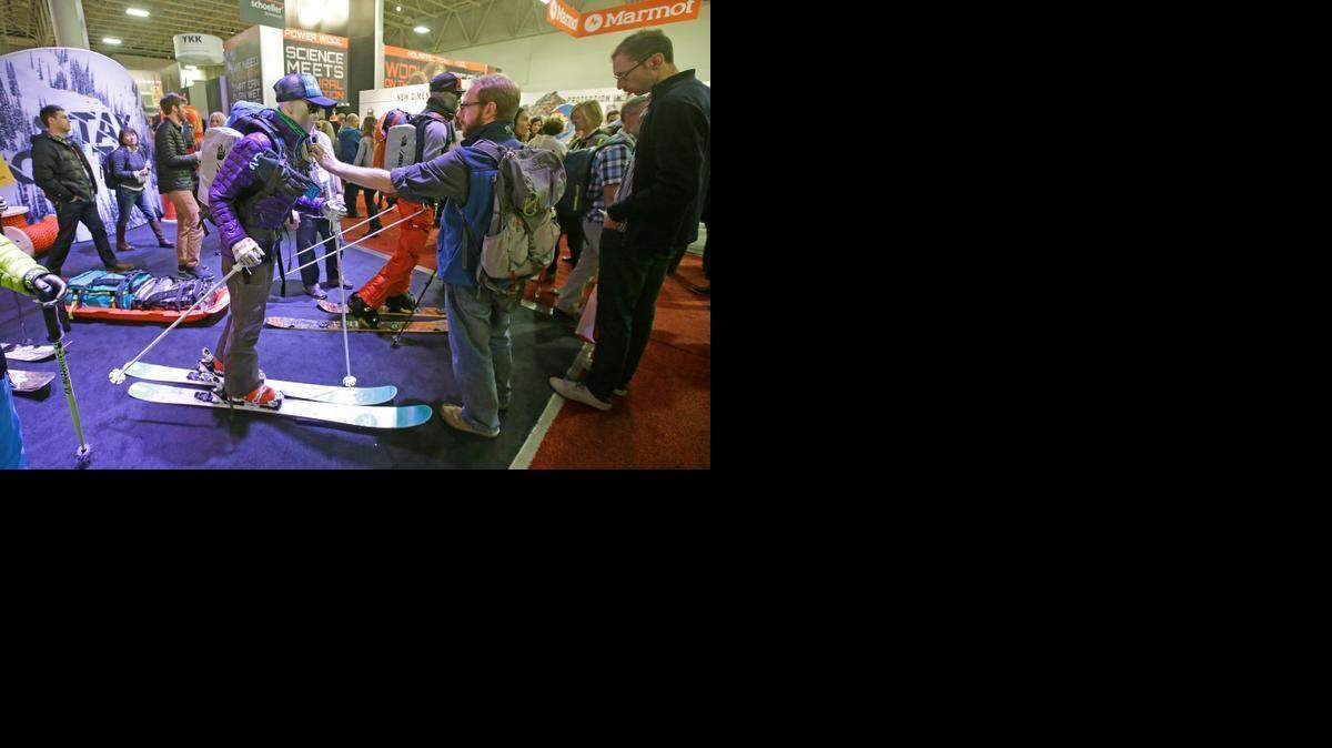 
Greg Willbond checks out the North Face exhibit at the Outdoor Retailer Show in Salt Lake City. Expo organizers say they're set to convene a group of industry leaders to discuss whether it makes sense to move the show out of Utah after their commitment runs out next year. The show has been in Utah since 1996 and is estimated to bring in an annual economic benefit of $40 million to the state. 
