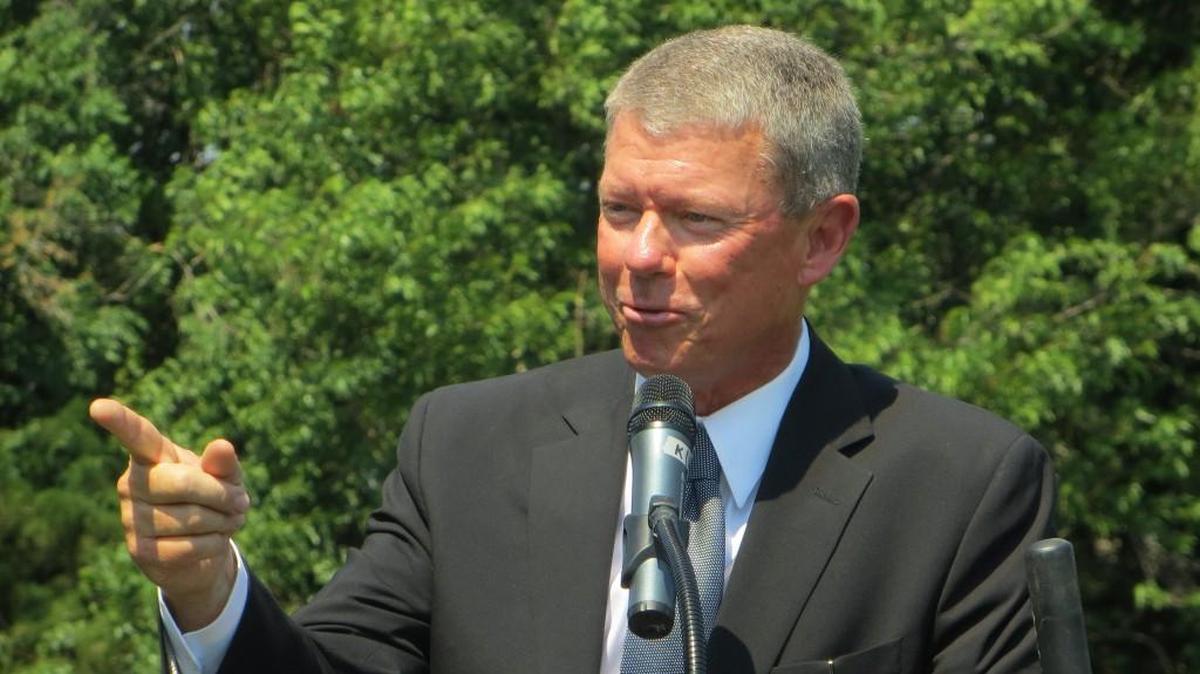 Ron Baldwin, chairman and co-founder of CrossFirst Bank, speaking at a groundbreaking for the bank’s Wichita office in 2013.