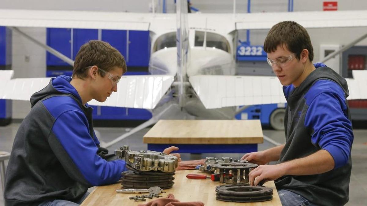 FILE -- Masen McCraken, left, and Travor McGraw take part in an aircraft maintenance job training program at Area Technical College.