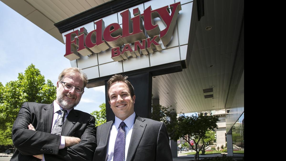 
Aaron Bastian, right, is taking over as Fidelity Bank’s next president. Bastian is the son of Clark Bastian, left, Fidelity chairman and CEO, and the third-generation to lead the bank as president. 
