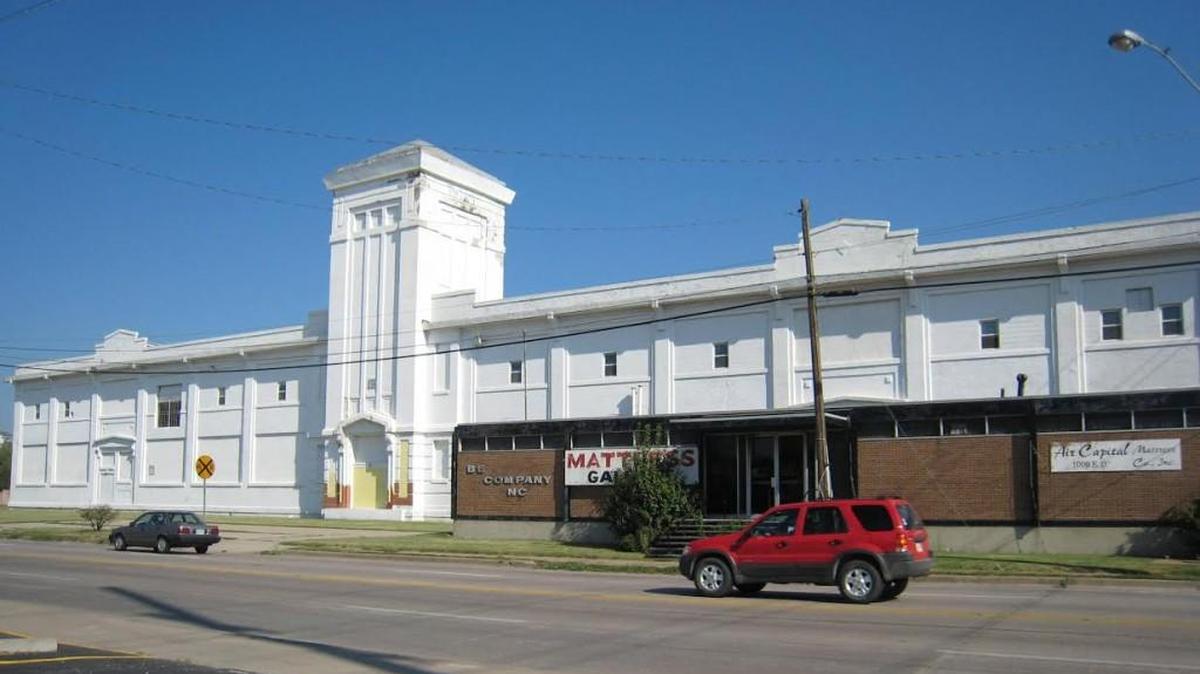 
This building on East 13th Street just west of the Canal Route has been a temporary address for U-Haul but now is a permanent one. 
