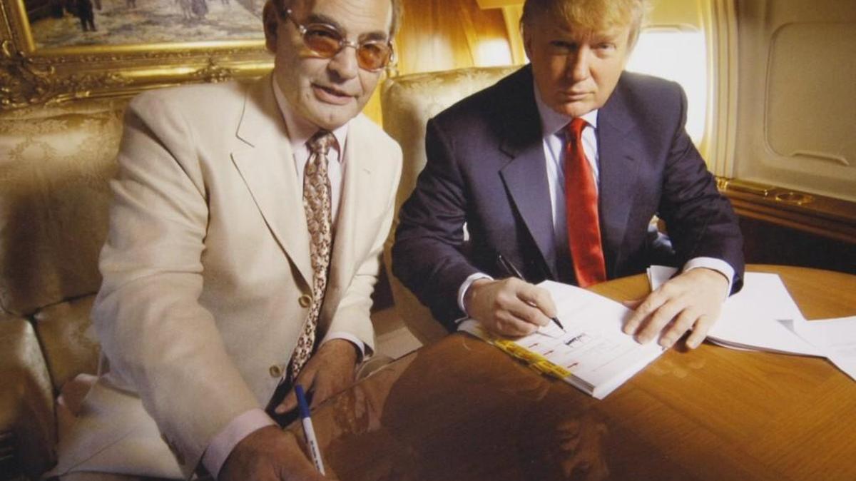 In his Las Vegas office, Phil Ruffin, left, has this photo of himself and his close friend Donald Trump, whom he’s supporting in a variety of ways in his bid for the White House.