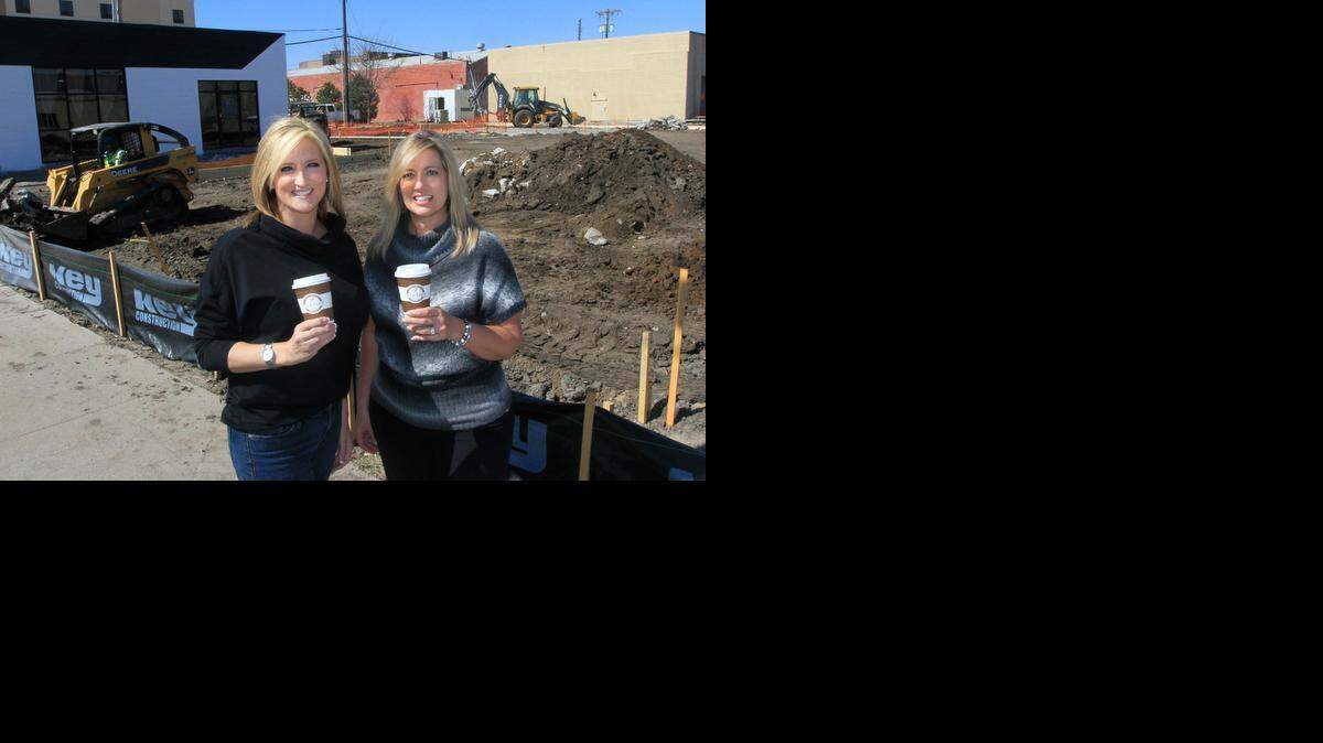 
It’s hard to believe there will be room, but Tolli Rasmussen, left, and DeNita Freeman are opening a Scooter’s Coffeehouse for franchisee Pat Do on the northwest corner of Second and Washington in Old Town. 
