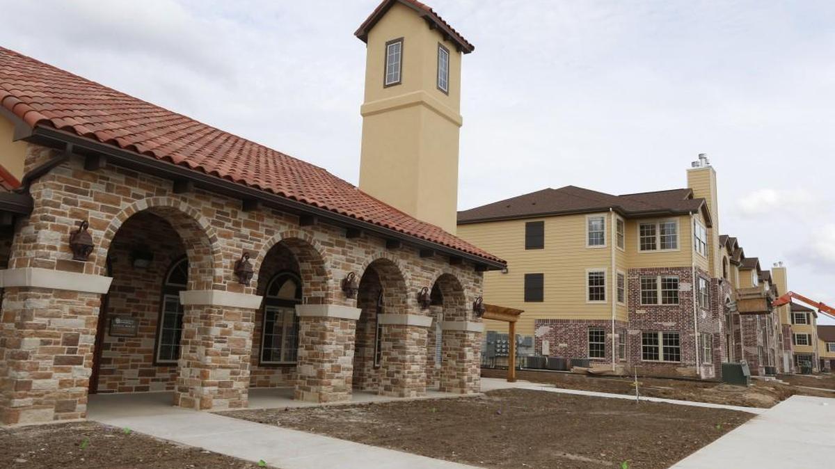 The new Tuscan-style Portofino Apartments at 127th Street East and Central will be ready for occupants late this year.