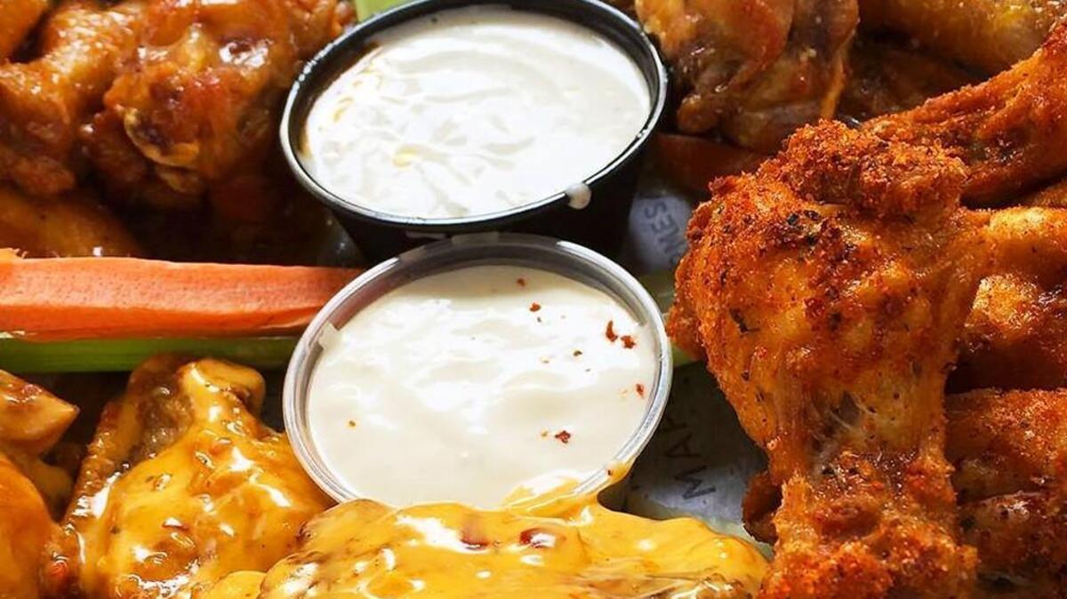 The new Hurricane Sports Grill will feature more than 35 flavors of wings along with other island-themed dishes and drinks.
