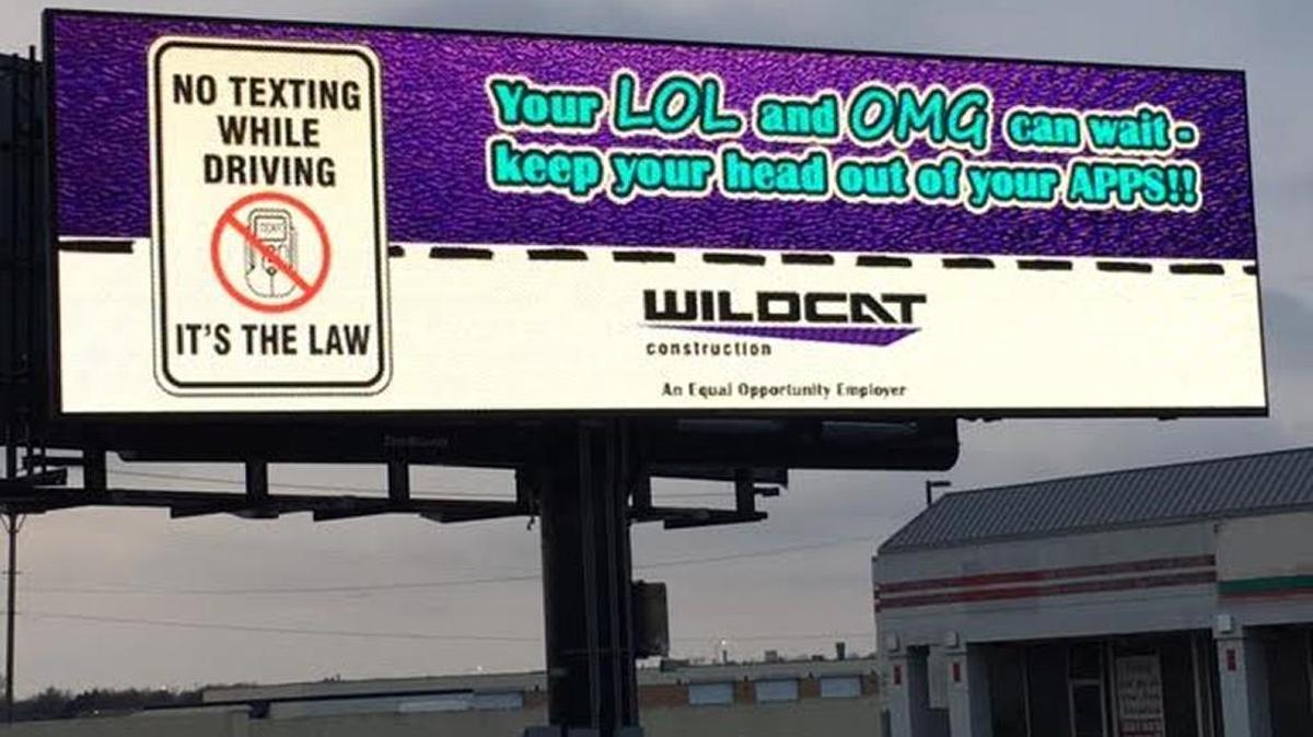 Wildcat Construction president Roger McClellan hopes this billboard at Kellogg and Webb Road makes people chuckle and inspires them to not text and drive.