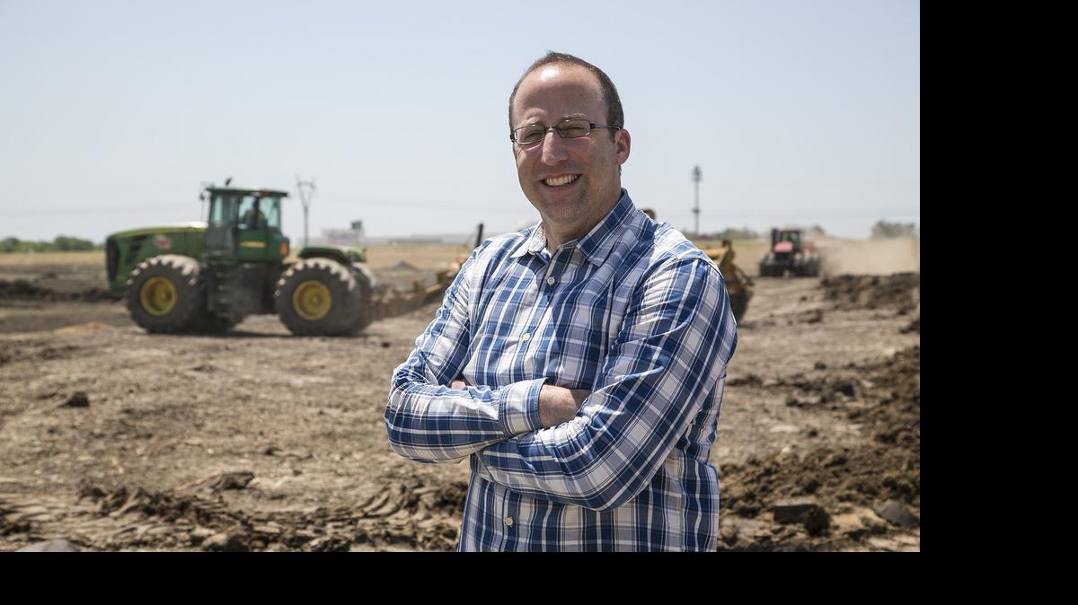 
Christian Ablah stands where work is underway at Greenwich Place, a new development at K-96 and Greenwich where the Wichita Sports Forum will locate along with a hotel, stores and restaurants. 
