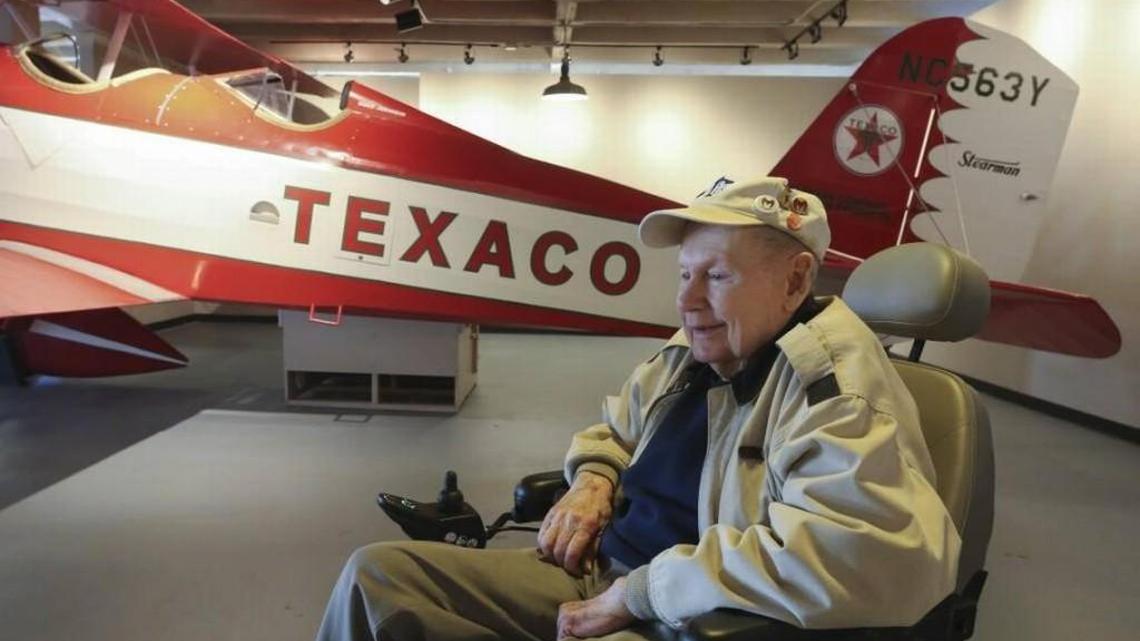 Walt House looks around a restored Stearman 4D. The plane took nine years to restore and was done by volunteers like House. The plane was originally produced at Stearman Aviation in Wichita, one of 41 ordered in 1934, just in time to prevent the assembly line from closing at the fledgling plant that became Boeing Wichita.