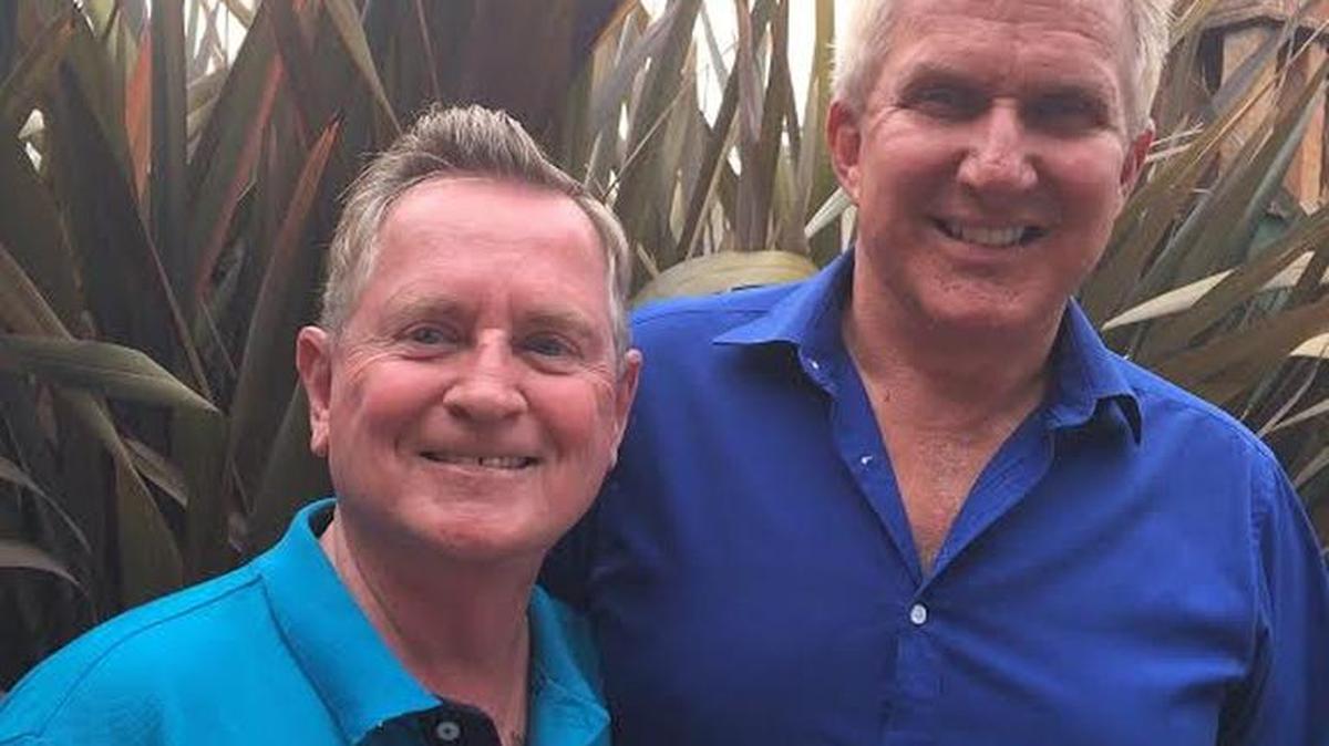 Jim Dobson-Kelley, left, and his husband, Iven Kelley-Dobson, on the highest terrace at their San Miguel de Allende, Mexico, home on Thursday morning, hours after learning that an arrest has been made in the 2005 fire at their former Wichita store, Twigs.