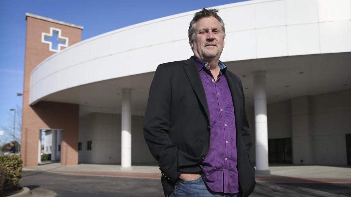 Mid America Exteriors is moving to the former American Red Cross building in the Douglas Design District. Mid America COO David Becker, an original founder of the business, stands in front of the building where the company will move in a couple of months.