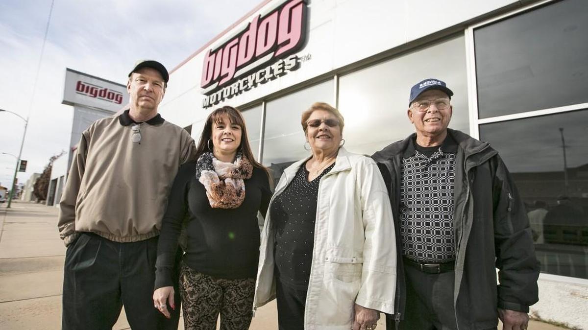 Fisher’s Transmissions owner Ron Fisher, right, his wife, Lise, and his children, Michelle and Todd, are moving their longtime business to part of the former Big Dog Motorcycles building on East Douglas.